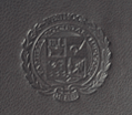 blind debossed seal on black leather